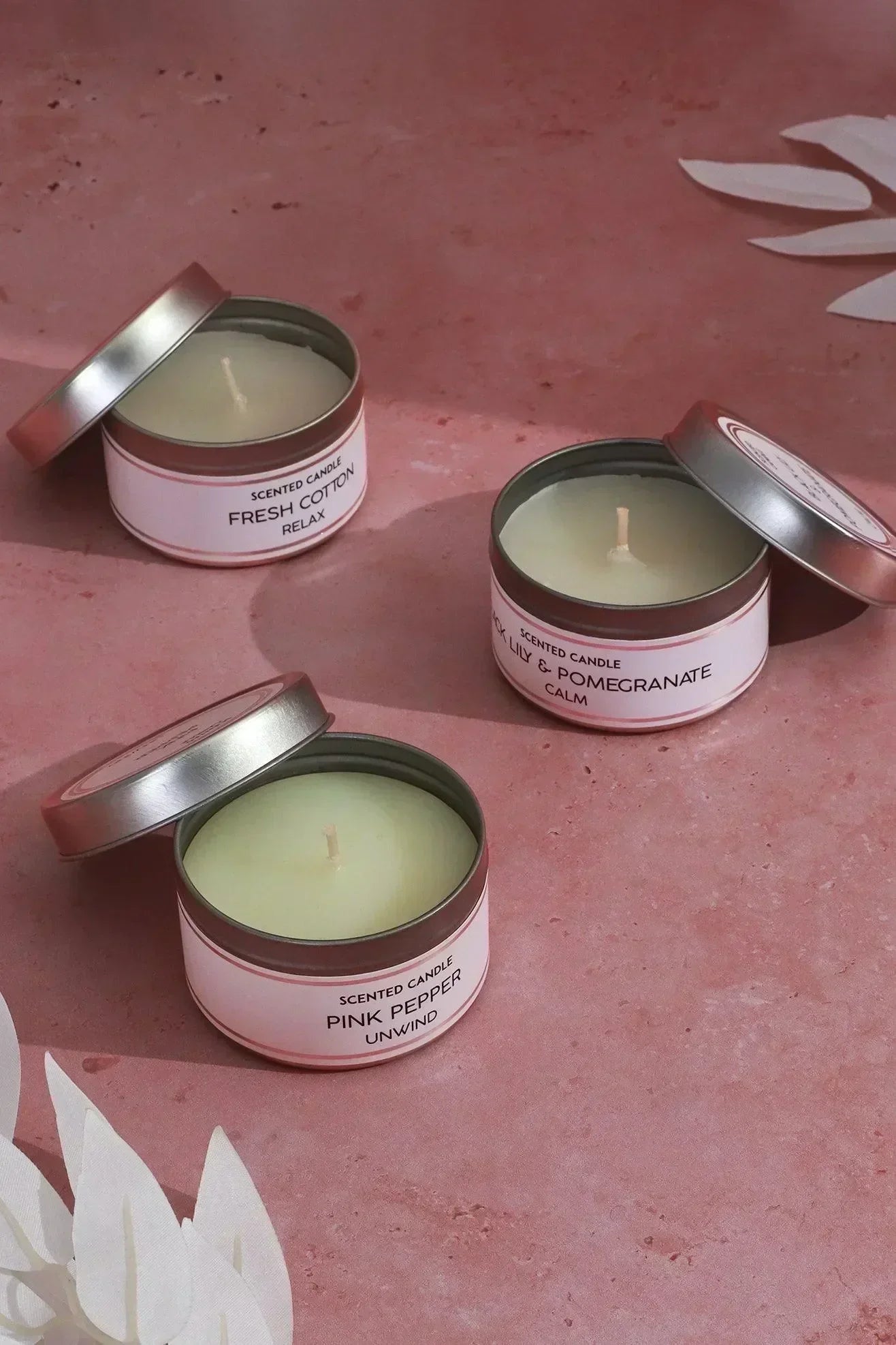 trio-serenity-set-of-3-scented-white-tin-candles-fresh-cotton-pink-pepper-and-black-lily-with-aromatherapy-scents-g-decor-24903 - G Decor