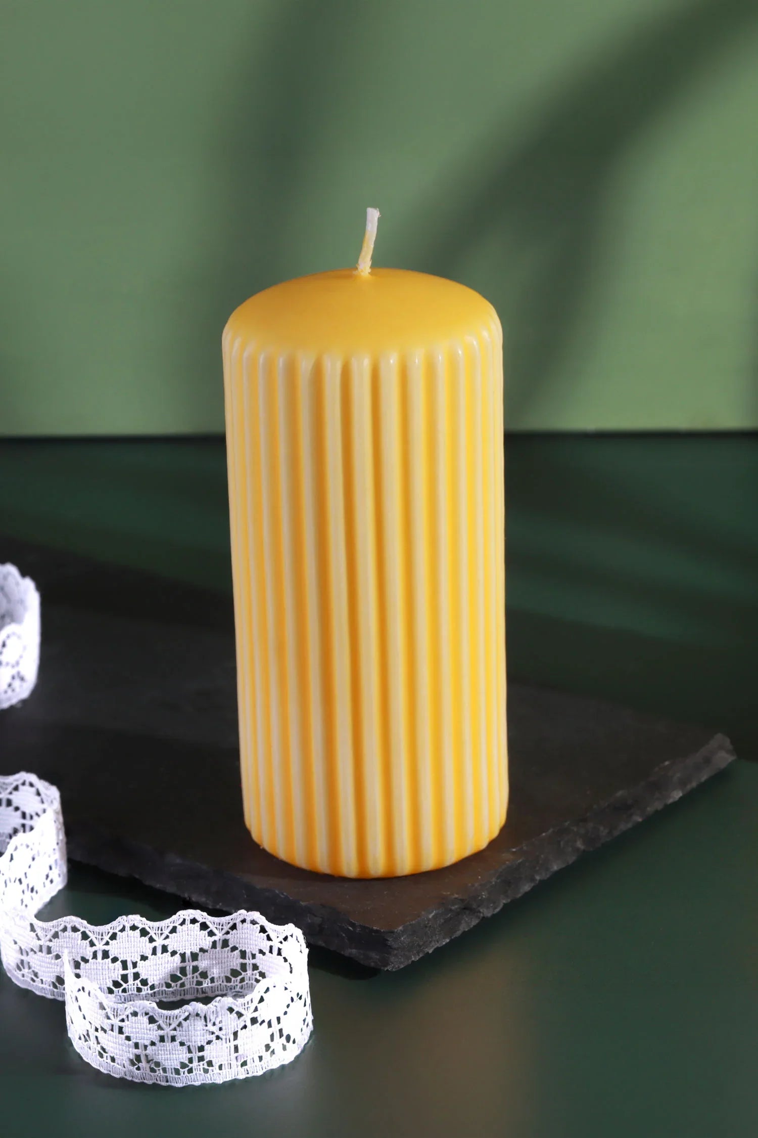 Velluto Ribbed Velvet Pillar Candle in Daffodil Yellow — lifestyle view, G Decor