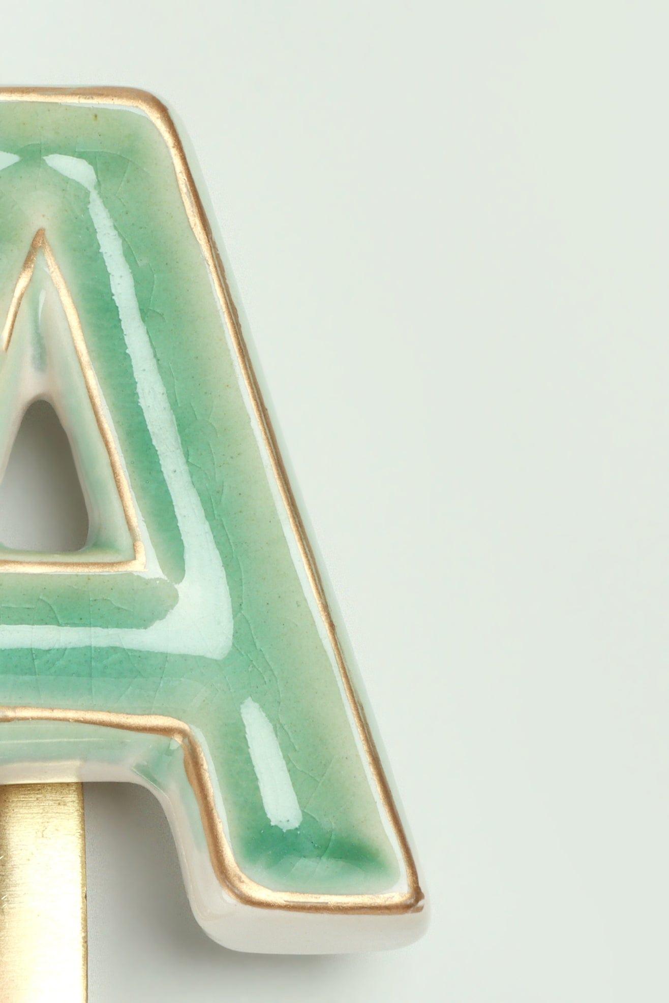 G Decor All Hooks Alphabet Green Crackle Glazed Hooks In Antique Brass