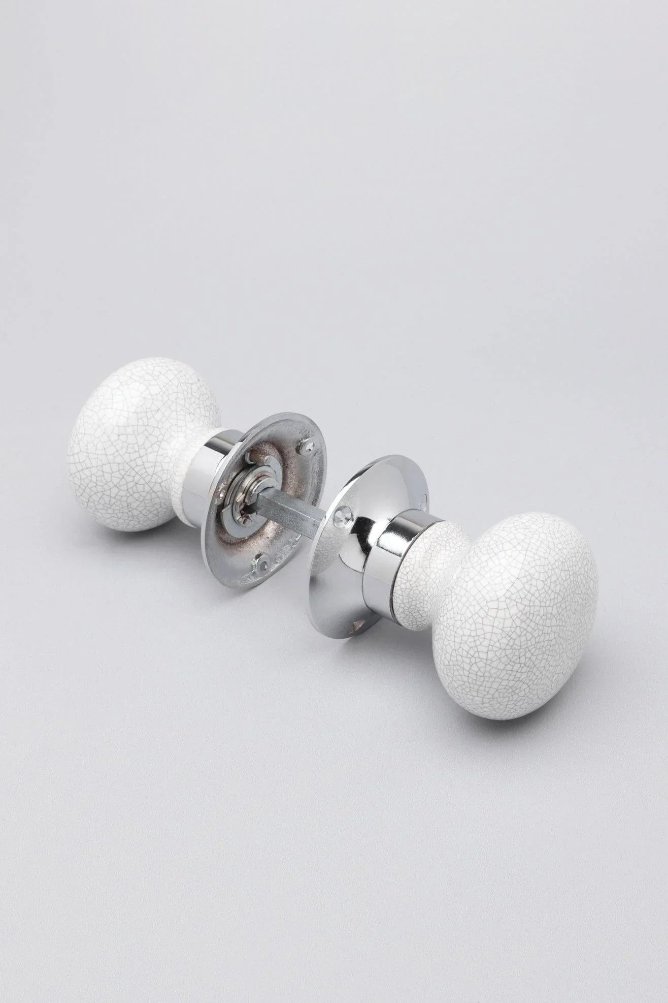 Crackle Glaze White Ceramic Mortice Door Knobs with Chrome Base — lifestyle view, G Decor
