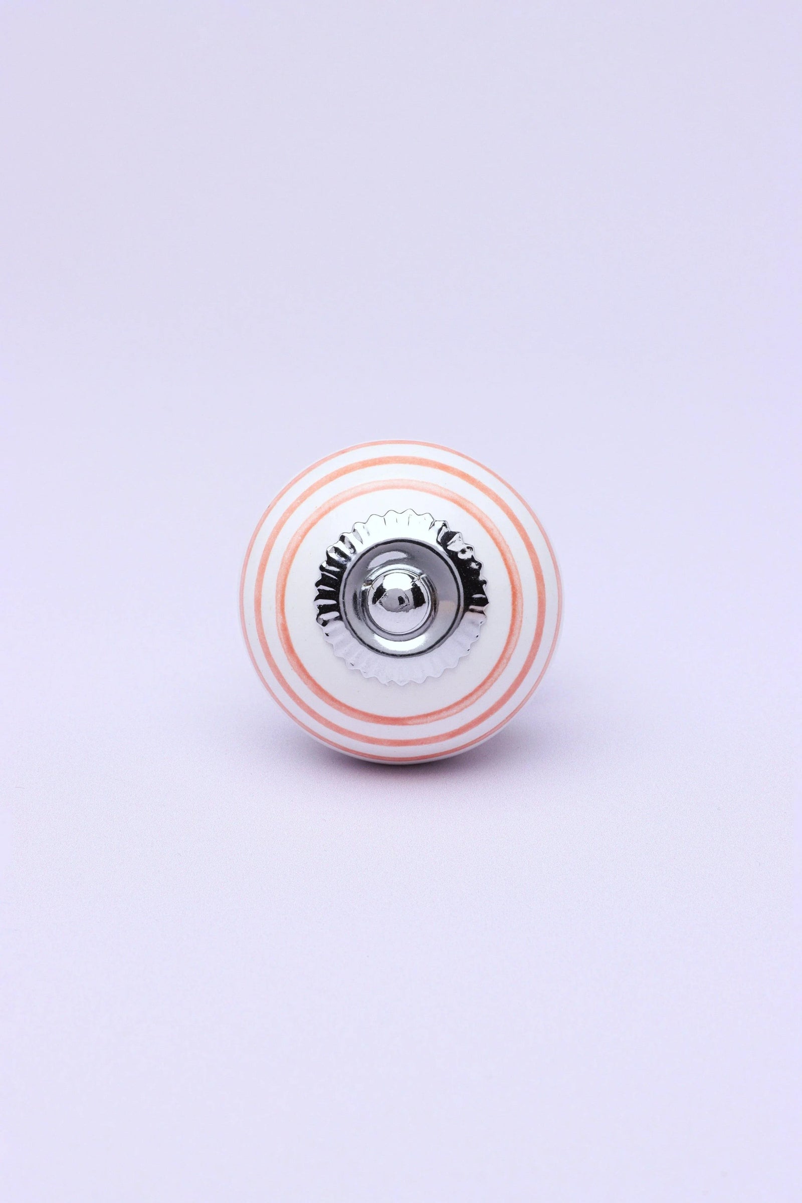 Striped Hand-Painted Ceramic Cabinet Knob in Pink and Yellow — close-up view, G Decor