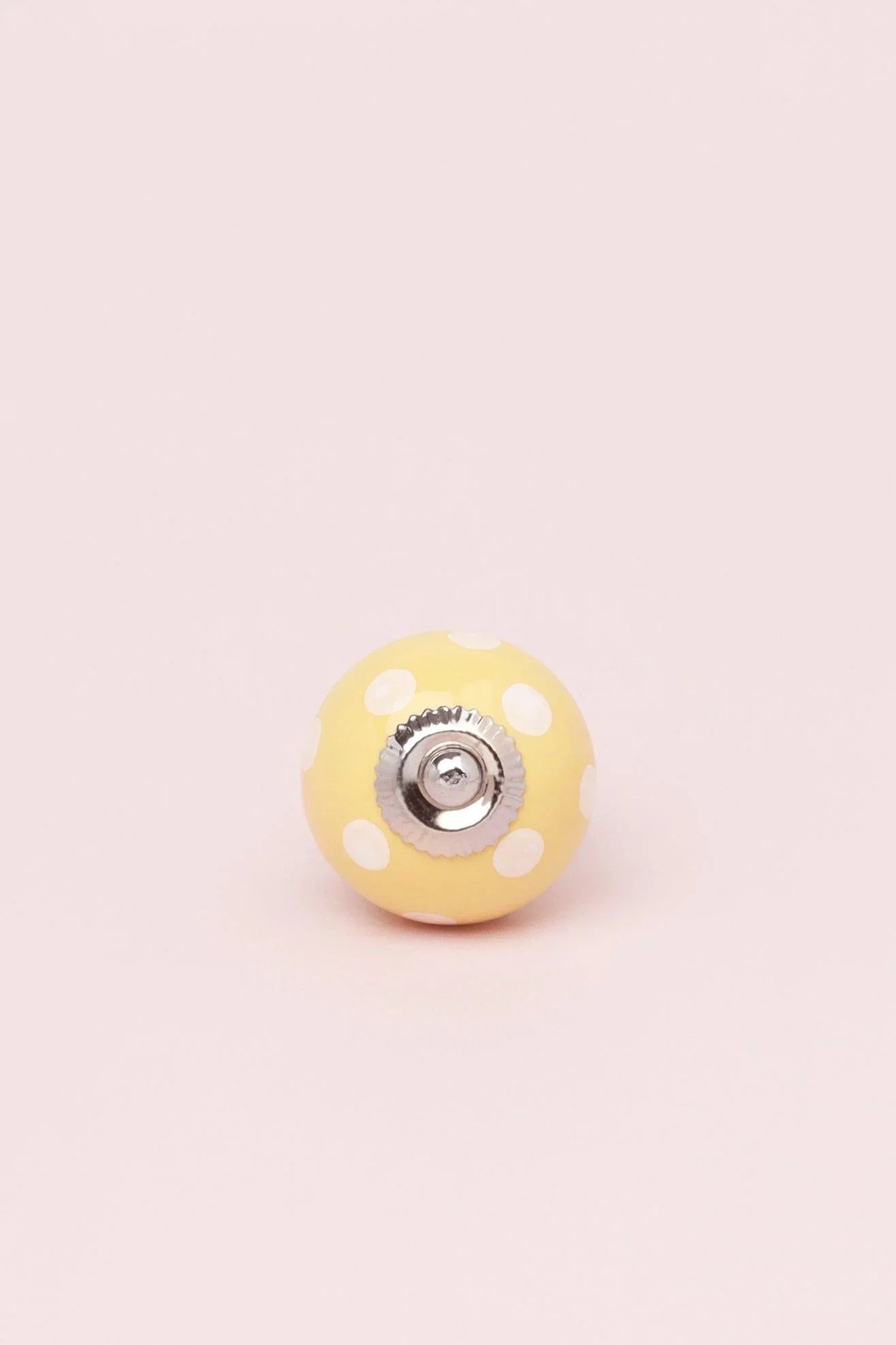 Polka Dot Ceramic Cabinet Knob in Pastel Pink and Yellow — close-up view, G Decor