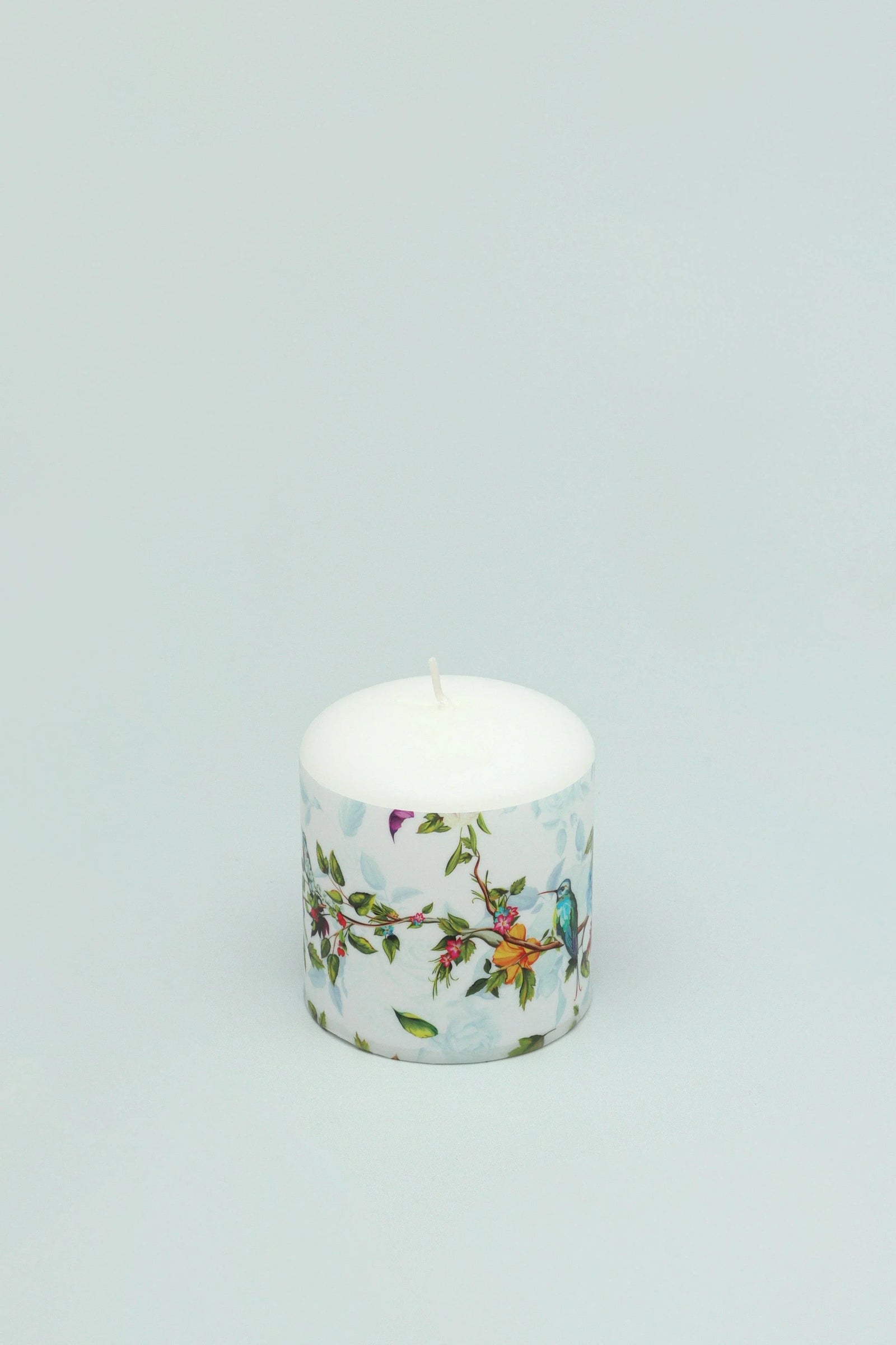 Hummingbird Southern Joy Summer Rose Garden Pillar Candle — lifestyle view, G Decor