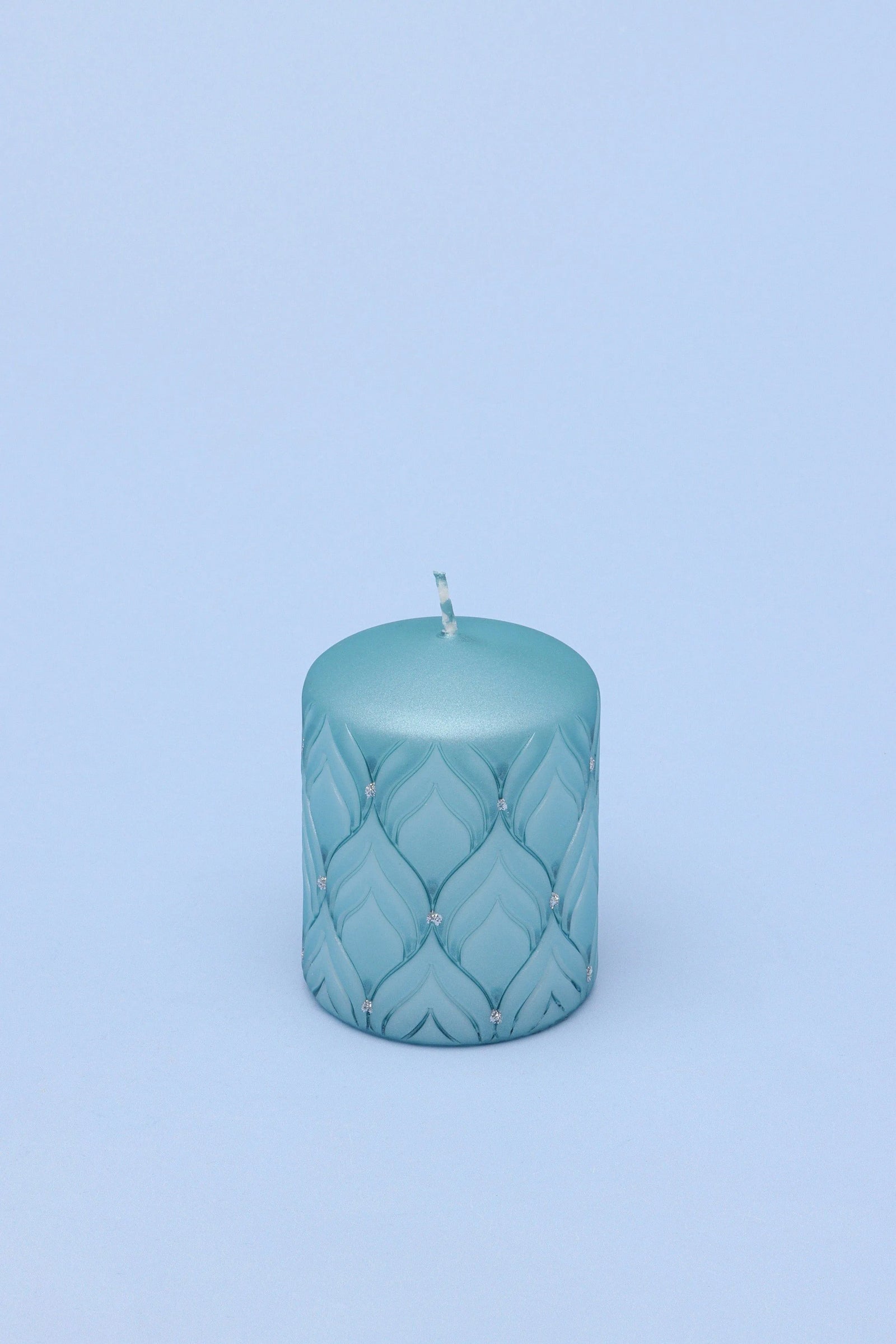 Frosted blue quartz pillar candle close-up showing surface detail — G Decor