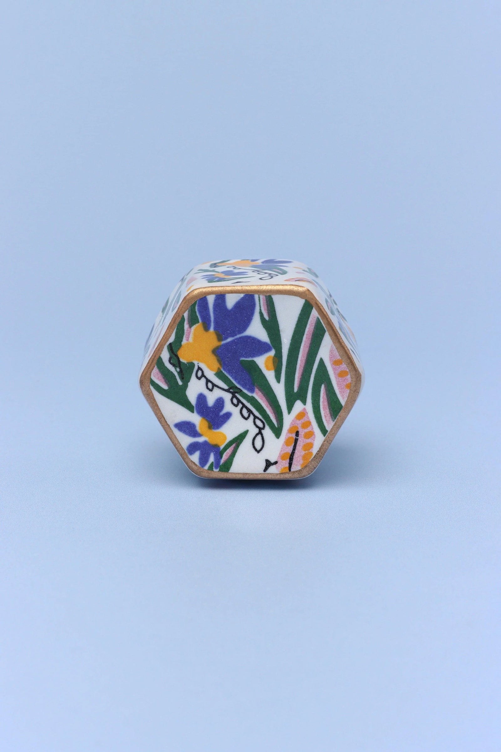 Joy Vibes ceramic cylinder cabinet knob close-up — abstract hand-painted pattern, G Decor