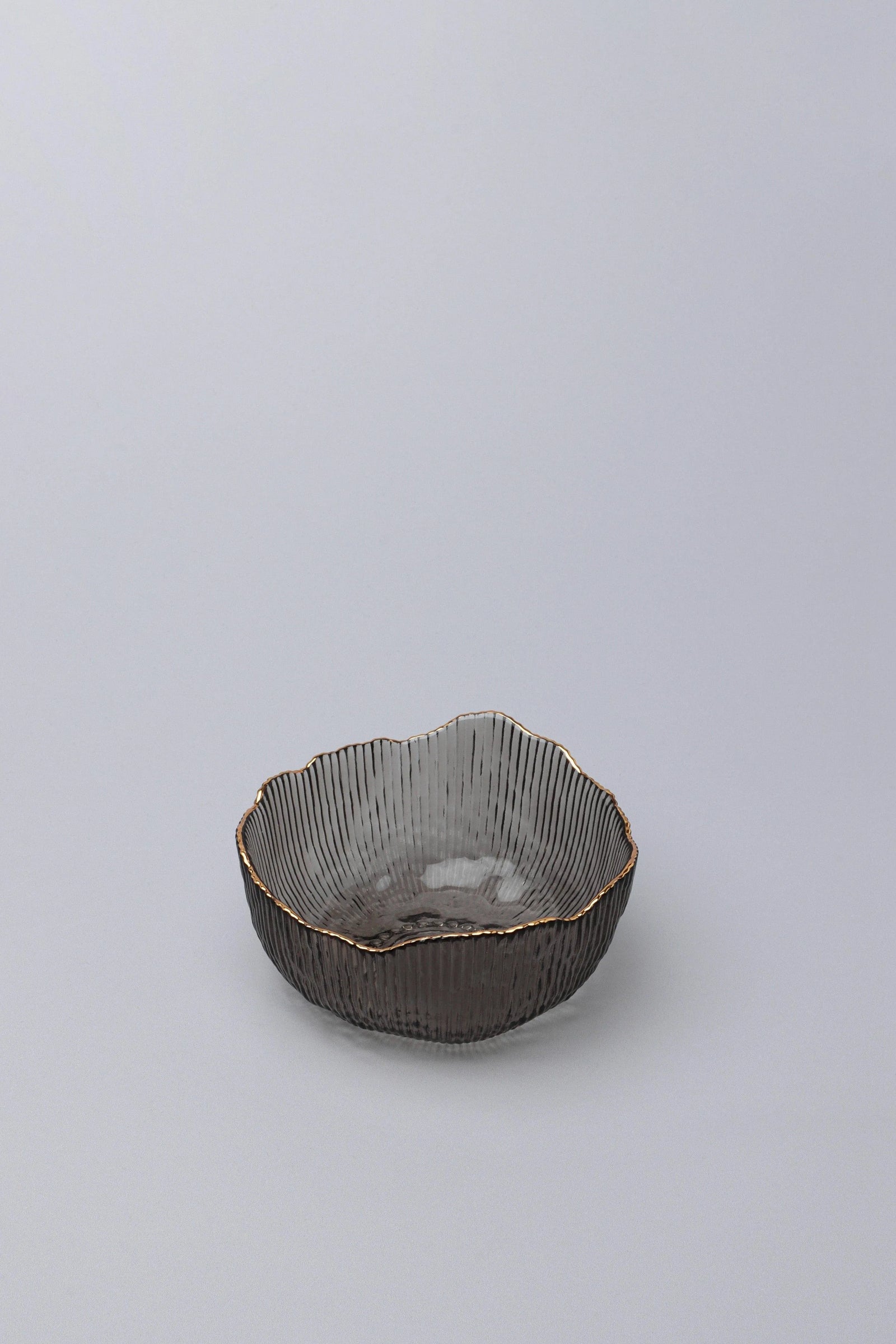 Large Calypso Pressed Glass Serving Bowl in Grey with Gold Rim — lifestyle view, G Decor