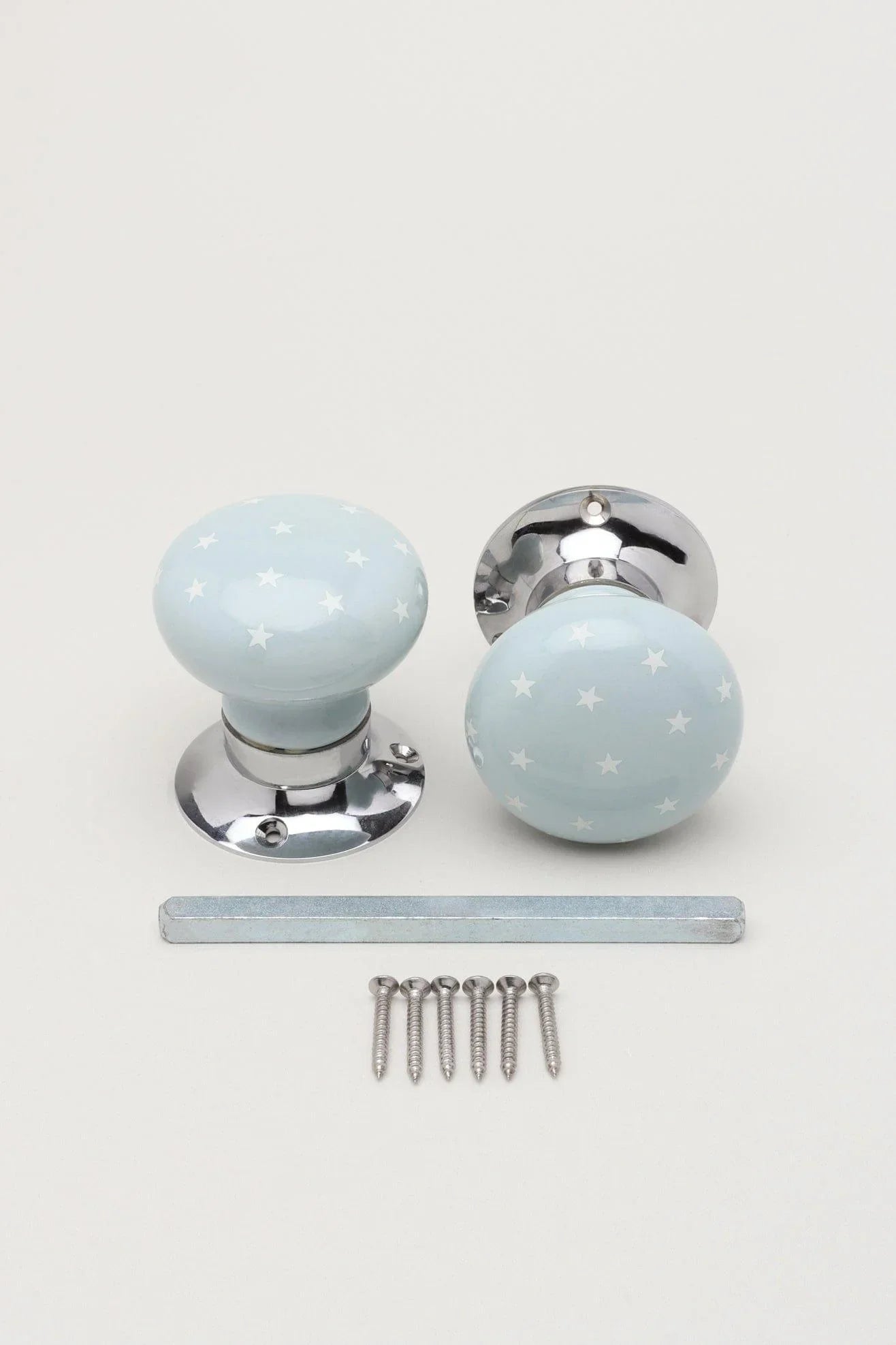 Little Stars Light Grey Ceramic Mortice Door Knobs with White Stars — close-up view, G Decor