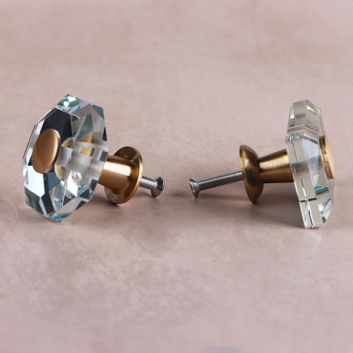 Side view of the octagon and rectangle glass knobs, showing the satin brass bases and fixing screws