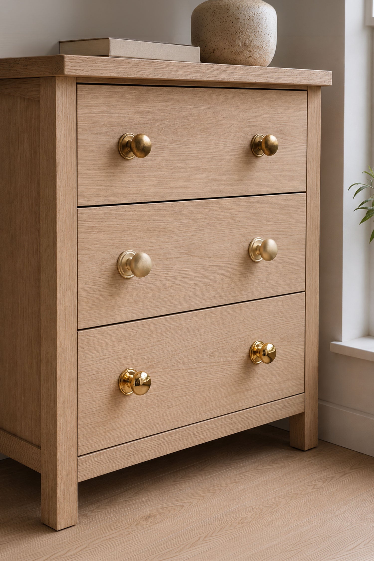 Bun cabinet knobs in polished, aged and satin brass, both sizes