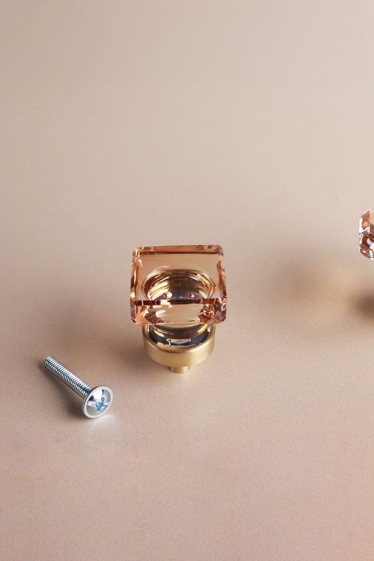 Square champagne crystal glass cabinet knob, 25mm, on a satin brass base
