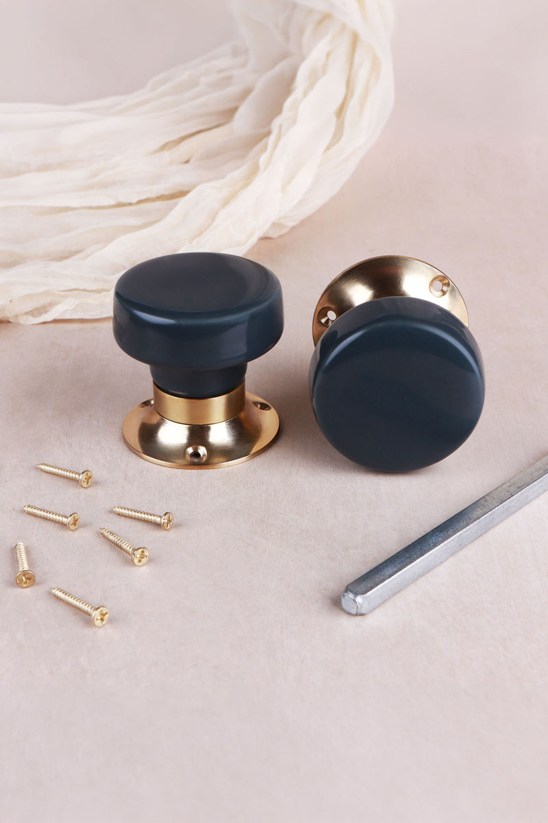 Charcoal Ceramic Mortice Door Knobs with Polished Brass Roses