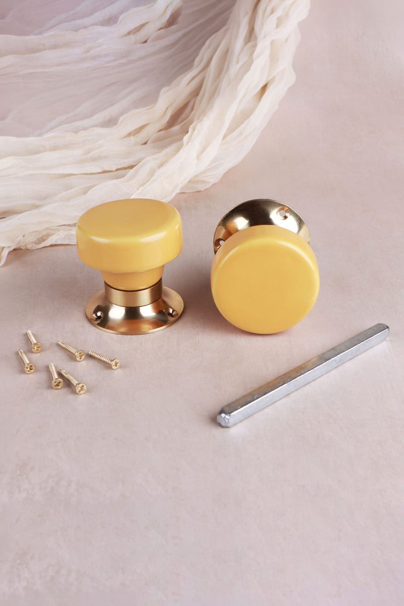 Yellow Ceramic Mortice Door Knobs with Polished Brass Roses