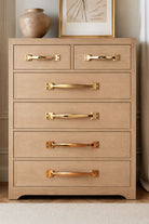 Brass cupboard pull handles in a room setting