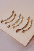 Solid brass cupboard pull handles, three finishes shown together