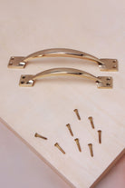 Cupboard pull handle in polished brass, both sizes with solid brass screws