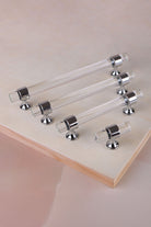 Clear crystal bar pull handles with polished chrome mounts, four sizes
