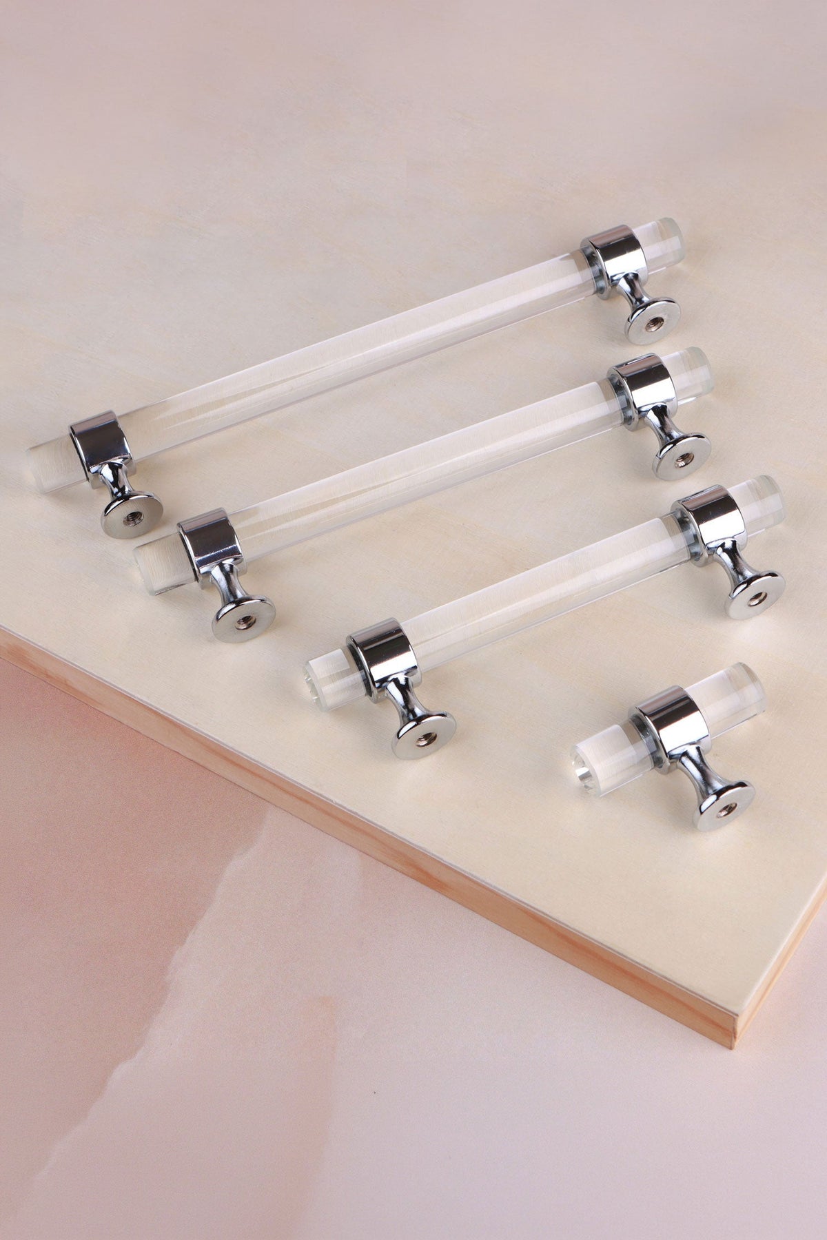 Crystal bar pull handle collection on a neutral background