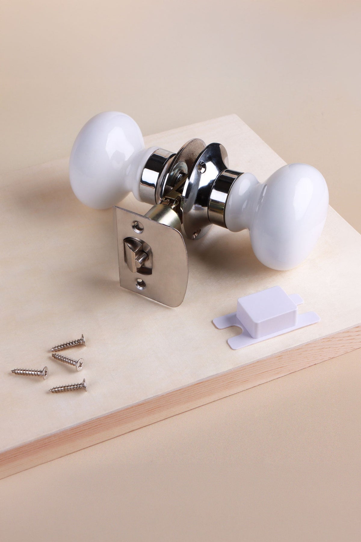 Complete tubular latch kit — latch body, dust socket, curved strike plate, spindle and four screws