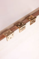 Solid brass backflap hinge, shown in polished, aged and satin brass