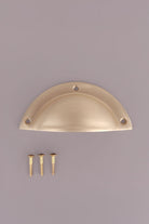 Half Moon cup pull in satin brass, lacquered finish
