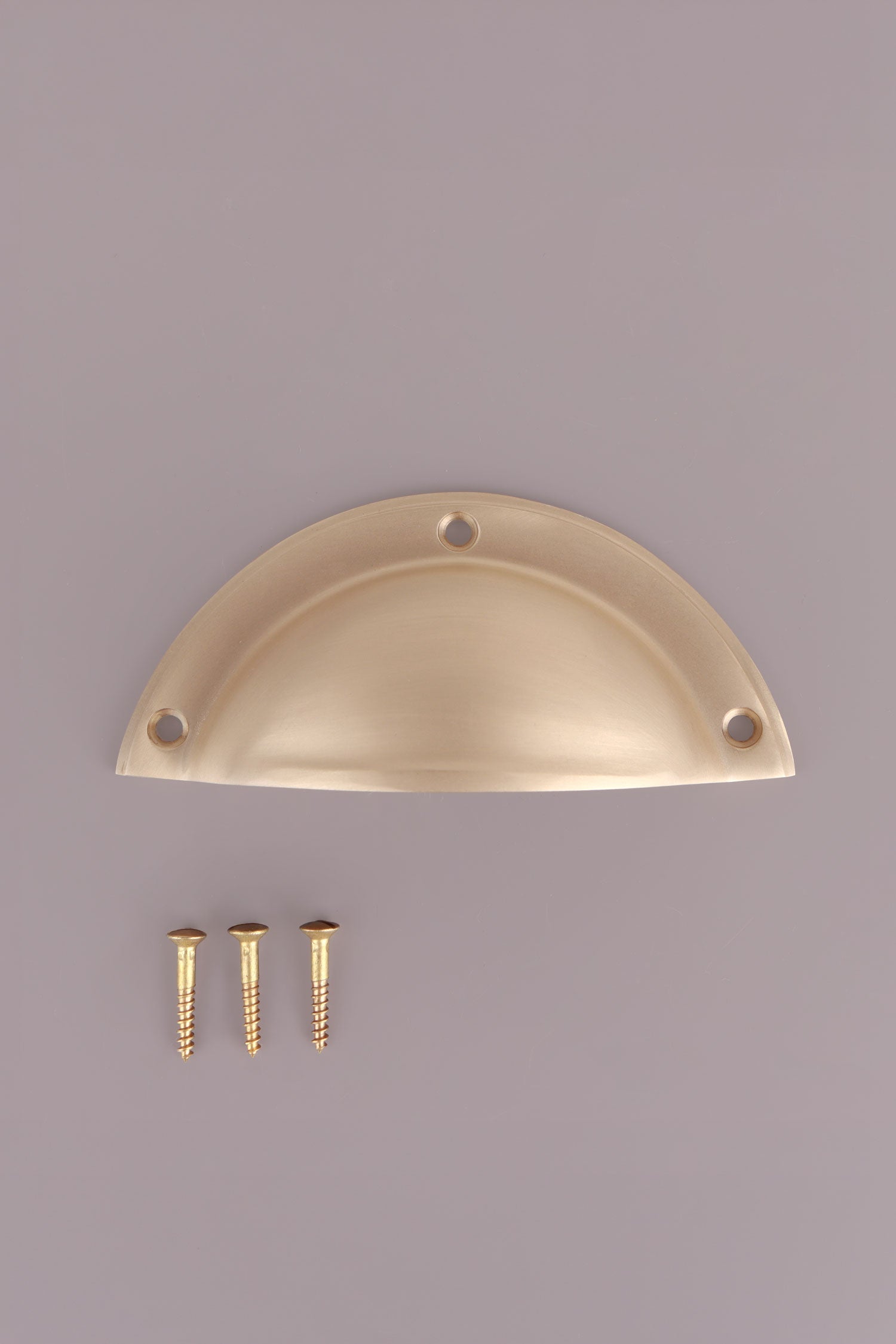 Half Moon cup pull in satin brass, lacquered finish