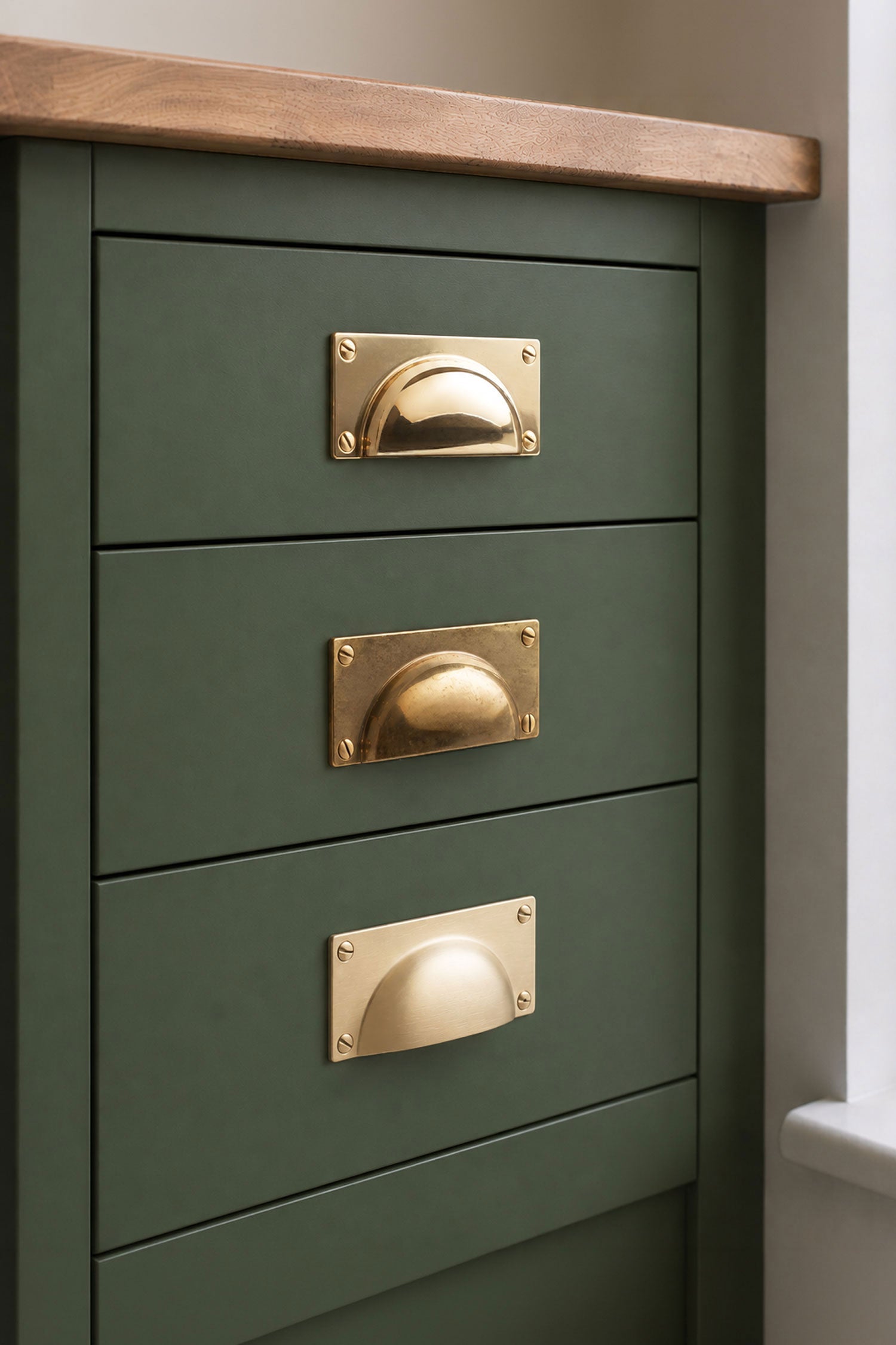 Three finishes of the Bevelled Plate cup pull side by side