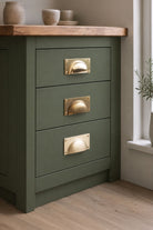 Bevelled Plate solid brass cup pull, shown in polished, aged and satin brass
