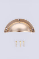 Stepped Rim cup pull in polished brass, unlacquered living finish