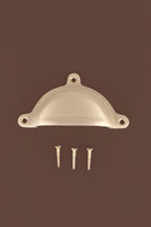 Classic cup pull in satin brass, lacquered finish