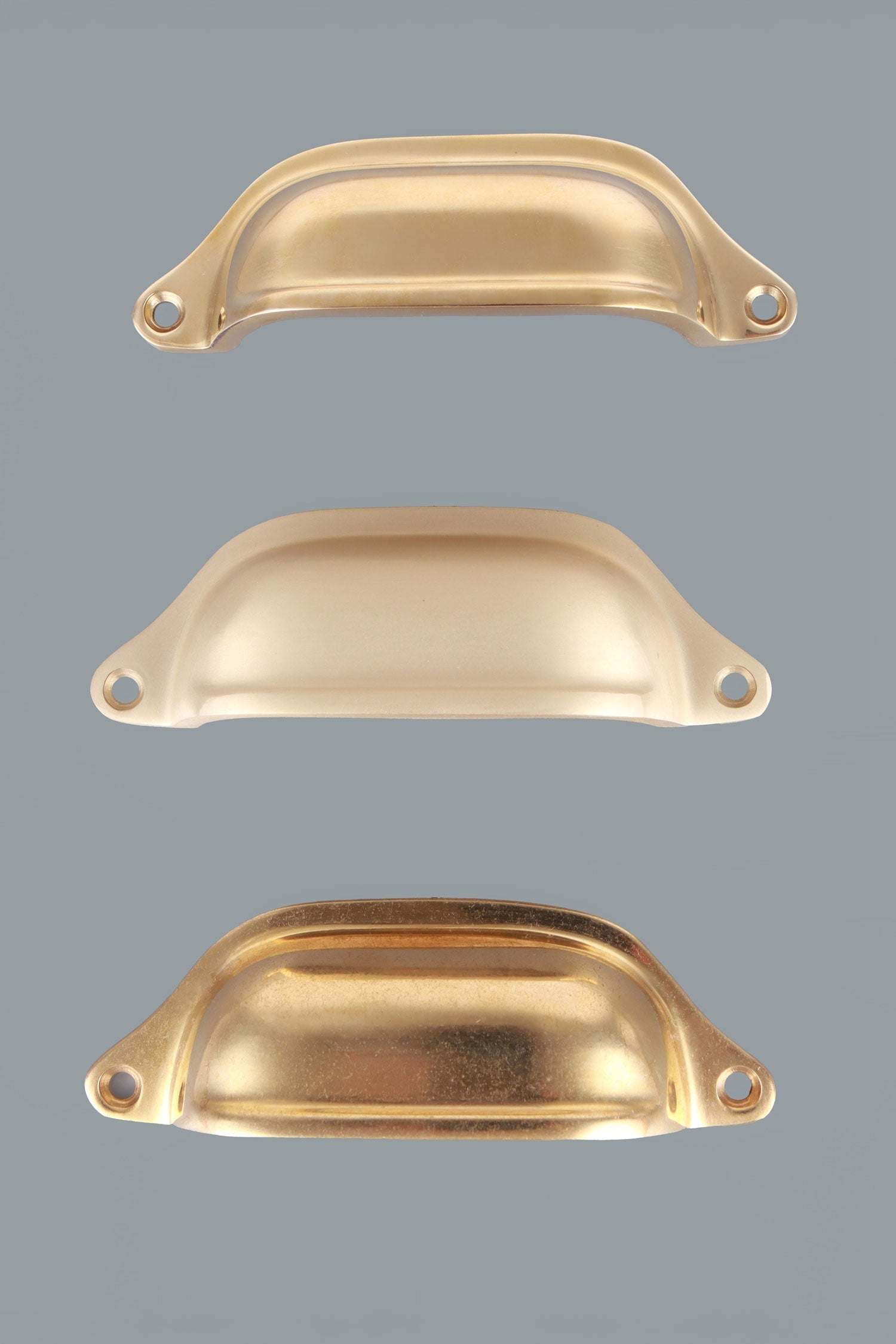 Deep Scoop brass cup pulls grouped, showing the deeper squarer bowl