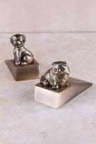 Cat and dog door stoppers together, antique brass