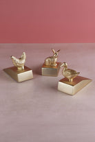 Homestead duck, hen and rabbit door stoppers in polished brass