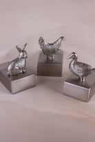 Chrome Homestead door stopper holding an interior door