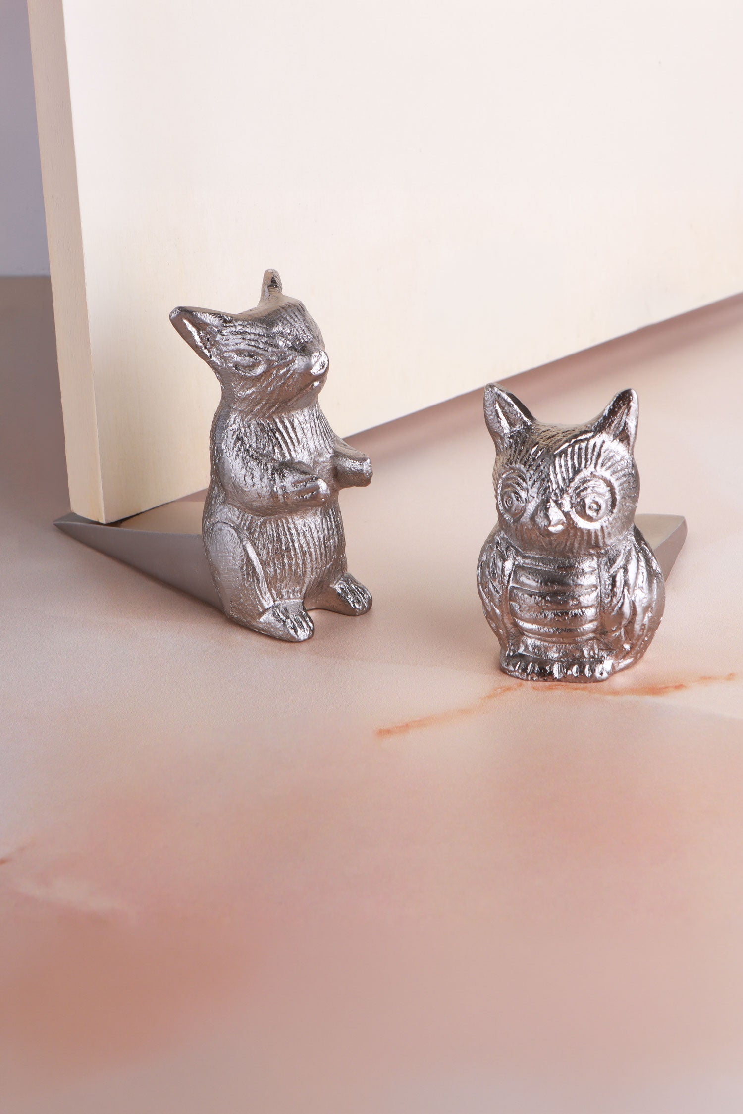 Woodland owl and squirrel door stoppers in chrome