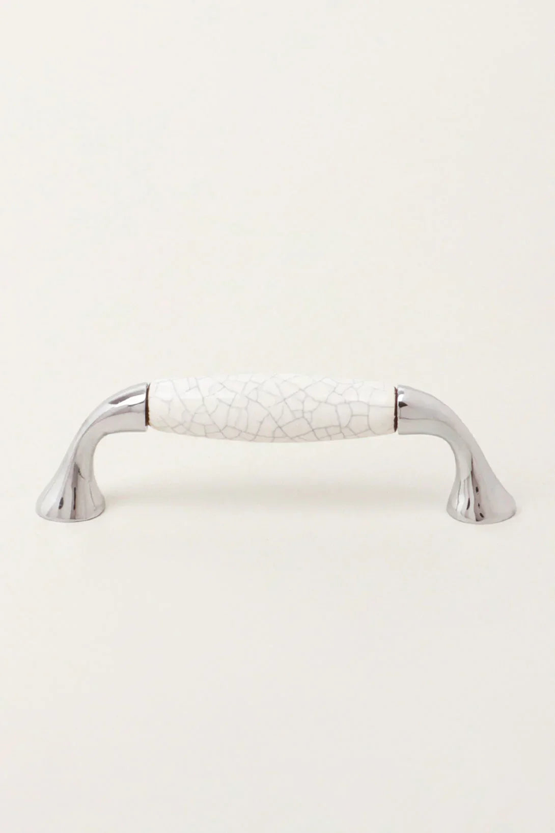 Quiet Living Crackle Ceramic Pull Handle in White and Soft Grey — lifestyle view, G Decor