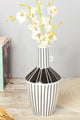 Modern black and white striped vase with white orchids on wooden table, G Decor home décor