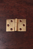 Aged brass backflap hinge with wide solid brass leaves