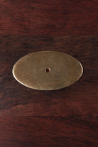 Oval solid brass backplate in aged brass, 70 x 40mm
