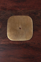 Rounded square solid brass backplate in aged brass, 50 x 50mm