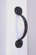 Black metal door pull handle mounted on a white surface, luxury hardware by G Decor