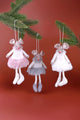 Three plush mouse Christmas ornaments in pastel skirts hanging from pine branches on a red background, G Decor home décor.