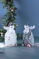 Frosted Reindeer Hand-Finished Wax Candle Figures in White or Grey — lifestyle view, G Decor
