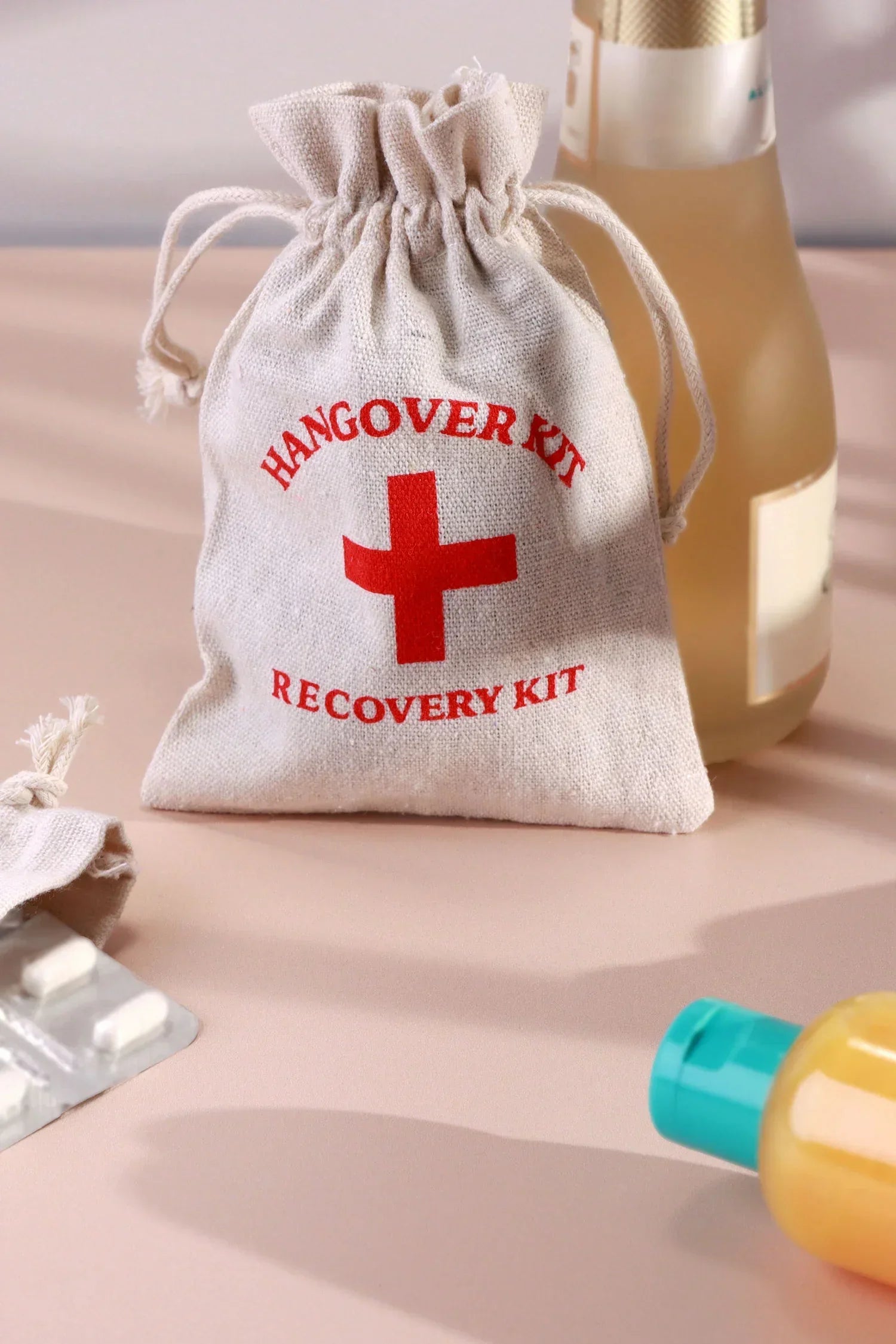 Pair of Hangover Kit Linen Gift Bags with Red Cross Design — alternate view, G Decor