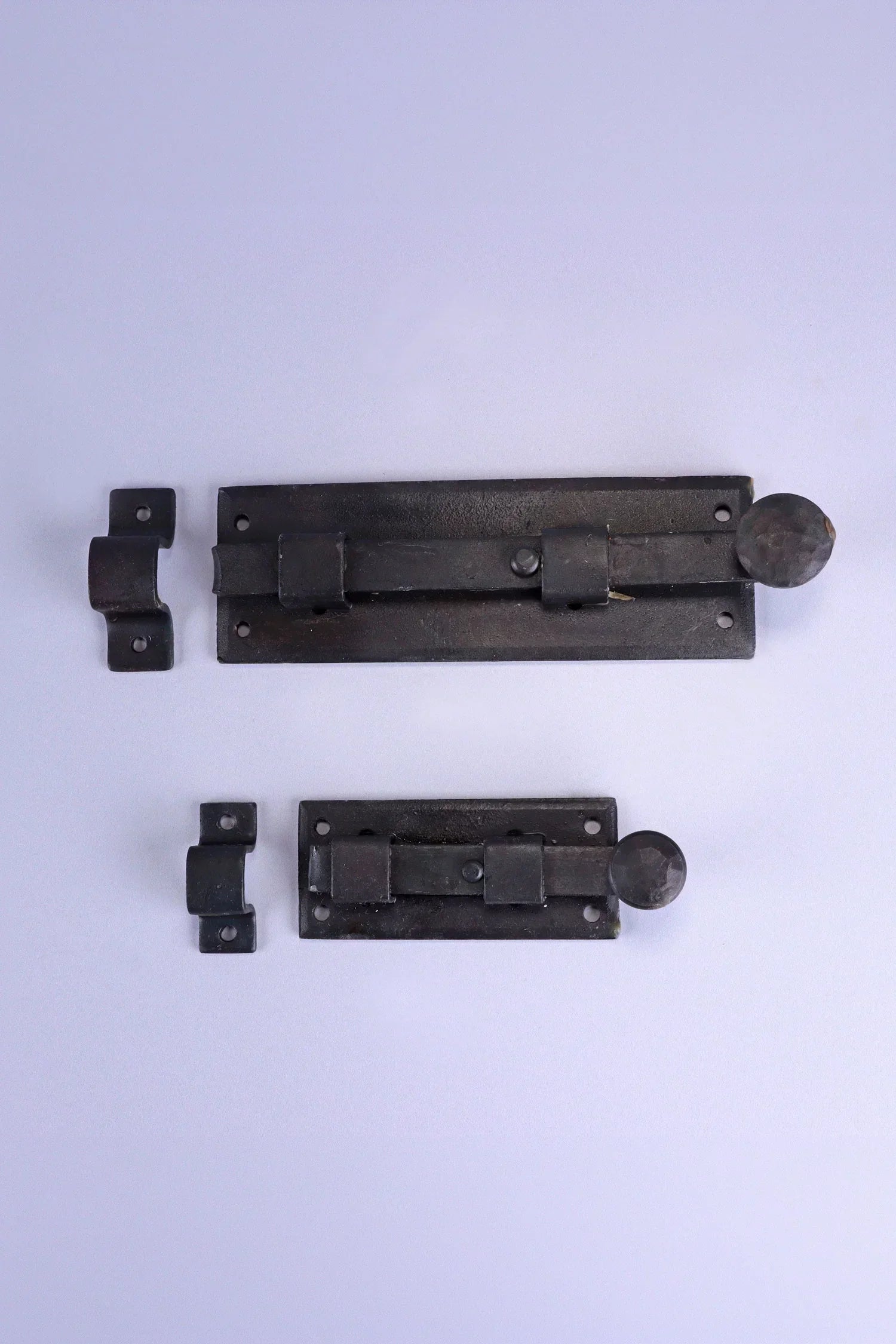 Hand-Forged Hammered Iron Sliding Door Bolt, Beeswax — lifestyle view, G Decor