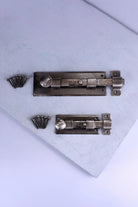 Hand-Forged Hammered Iron Sliding Door Bolt, Pewter — close-up view, G Decor
