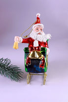 On the Way Santa in Sleigh Large Handcrafted Glass Christmas Bauble — close-up view, G Decor
