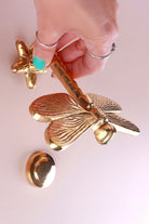 Dragonfly Polished Brass Door Knocker — close-up view, G Decor