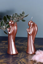 Celestielle Pair of Rose Gold Sculptural Angel Candles — lifestyle view, G Decor