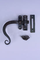 Hand-Forged Monkey Tail Window Fastener, Beeswax — close-up view, G Decor
