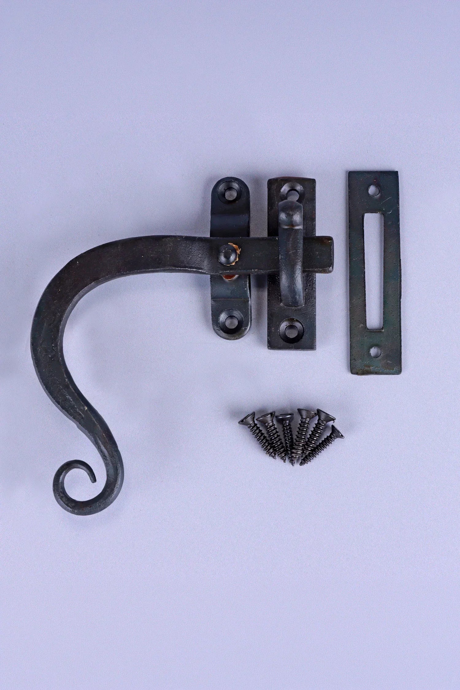Hand-Forged Monkey Tail Window Fastener, Beeswax — close-up view, G Decor